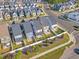 Overhead shot of homes with manicured lawns, shrubbery, and fenced yards offering privacy and beauty at 1272 Brown Velvet Ln, Apex, NC 27523