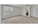 Bedroom with carpet, double pane windows, and ensuite bathroom at 1272 Brown Velvet Ln, Apex, NC 27523