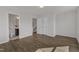 Spacious bedroom with wood-look floors and a view of the ensuite bathroom at 1272 Brown Velvet Ln, Apex, NC 27523