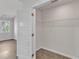 Walk-in closet featuring wire shelving and wood flooring at 1272 Brown Velvet Ln, Apex, NC 27523