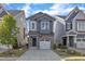 Charming two-story home with a well-manicured lawn, a driveway, and an attached garage at 1272 Brown Velvet Ln, Apex, NC 27523