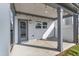 Relaxing covered patio with stylish lighting and access to the lush backyard at 1272 Brown Velvet Ln, Apex, NC 27523
