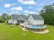 Expansive backyard featuring a refreshing above-ground pool and multiple deck areas at 140 Crystal Pl, Benson, NC 27504