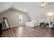 Spacious bedroom featuring wood floors, neutral walls, and an airy, vaulted ceiling at 140 Crystal Pl, Benson, NC 27504