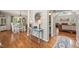 Inviting entryway with hardwood floors leading to a dining area and a cozy living room at 140 Crystal Pl, Benson, NC 27504