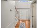 Bright foyer with hardwood floors, staircase, and a front door with decorative glass panels at 140 Crystal Pl, Benson, NC 27504