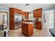Modern kitchen with stainless steel appliances, an island, and beautiful countertops at 140 Crystal Pl, Benson, NC 27504