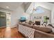 Inviting living room with high vaulted ceilings, a fireplace, and a comfortable seating arrangement at 140 Crystal Pl, Benson, NC 27504