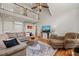 Spacious living room featuring an open floor plan, hardwood floors, and a cozy seating area at 140 Crystal Pl, Benson, NC 27504