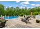 Inviting pool area featuring a spacious deck for sunbathing and outdoor seating at 140 Crystal Pl, Benson, NC 27504