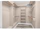 Walk-in closet with wood floors and shelving for ample storage and organization at 1576 Cheves Rd, Zebulon, NC 27597