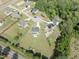 Aerial view of homes with large yards showcasing the neighborhood layout and green spaces at 180 Packhouse Ct, Angier, NC 27501