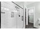 Modern bathroom featuring a glass shower with white subway tile and black fixtures at 180 Packhouse Ct, Angier, NC 27501
