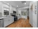 Modern kitchen featuring white cabinets, stainless steel appliances, and an open layout at 1809 Glendale Ave, Durham, NC 27701