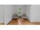 Cozy sitting area featuring hardwood floors and comfortable chairs near natural light at 1809 Glendale Ave, Durham, NC 27701