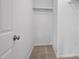 Walk in closet with shelf and rod for storage at 1832 Elkpark Dr, Raleigh, NC 27610