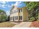Charming two-story home featuring a driveway and a well-maintained front yard at 1832 Elkpark Dr, Raleigh, NC 27610