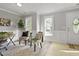 Inviting living room with hardwood floors, stylish furniture, and neutral decor at 1832 Elkpark Dr, Raleigh, NC 27610
