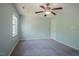 Bedroom features carpeted floors and a window for plenty of natural light at 2032 Lime St, Durham, NC 27704