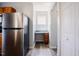 The kitchen area has stainless steel appliances and a built-in desk at 2032 Lime St, Durham, NC 27704