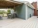 Home back deck with table, chairs, and wood ceiling at 204 Wiley Oaks Dr, Wendell, NC 27591