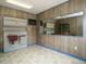 Basement laundry area with vintage sink and vanity area with lots of storage space at 204 Wiley Oaks Dr, Wendell, NC 27591