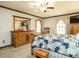 Comfortable bedroom with wooden furniture and a tranquil atmosphere at 204 Wiley Oaks Dr, Wendell, NC 27591