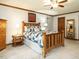 Comfortable bedroom featuring wood trim, a ceiling fan and a full furniture set at 204 Wiley Oaks Dr, Wendell, NC 27591