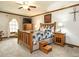 Inviting bedroom with wooden furniture set and ceiling fan for added comfort at 204 Wiley Oaks Dr, Wendell, NC 27591