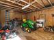 Spacious garage with wooden walls and ceiling providing ample storage space for equipment at 204 Wiley Oaks Dr, Wendell, NC 27591