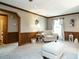 Bright living room featuring neutral decor, trim details and large picture window at 204 Wiley Oaks Dr, Wendell, NC 27591