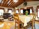 Bright living room with wood beam ceiling, hardwood floors and dining area at 204 Wiley Oaks Dr, Wendell, NC 27591