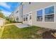 A view of the backyard area with green grass at 205 Begen St, Morrisville, NC 27560
