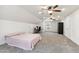 Bright bedroom offers neutral decor, carpeted floor, and ample space for relaxation at 205 Begen St, Morrisville, NC 27560