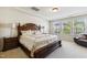 Spacious main bedroom suite with tray ceiling and large windows for plenty of natural light at 205 Begen St, Morrisville, NC 27560