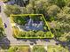 A bird's-eye view of a charming property surrounded by lush greenery and trees at 2123 Fountain Ridge Rd, Chapel Hill, NC 27517