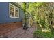 Backyard with a brick patio, storage shed and treed yard at 2123 Fountain Ridge Rd, Chapel Hill, NC 27517
