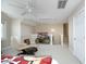 Bonus room with TV and entertainment center, chair with footrest, ceiling fan, and carpeted floor at 2318 Carriage Oaks Dr, Raleigh, NC 27614