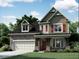 Charming two-story home with stone accents, red shutters and a welcoming front porch, perfect for suburban living at 2383 Picual Way # 24, New Hill, NC 27562