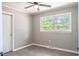 Bedroom with neutral walls and a large window providing natural light at 2500 Courtland Dr, Sanford, NC 27330