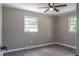 Bedroom with two windows that allow plenty of natural light at 2500 Courtland Dr, Sanford, NC 27330