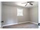 Bedroom with a ceiling fan, neutral walls, and wood-look flooring at 2500 Courtland Dr, Sanford, NC 27330