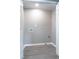A utility room featuring gray walls and gray flooring with washer hookups at 2500 Courtland Dr, Sanford, NC 27330