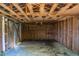 Interior of a wooden shed with wooden beams, walls and concrete floor at 2500 Courtland Dr, Sanford, NC 27330
