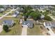 Aerial view of a home with a large yard in a quiet residential neighborhood at 281 Highland Forest Dr, Sanford, NC 27332