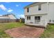 Backyard featuring a wooden deck and brick patio area for outdoor enjoyment at 281 Highland Forest Dr, Sanford, NC 27332