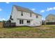 Backyard featuring a deck and patio area surrounded by a wooden fence at 281 Highland Forest Dr, Sanford, NC 27332