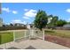Spacious backyard with a deck, brick patio, storage building and mature trees at 281 Highland Forest Dr, Sanford, NC 27332