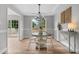Charming dining area with a round table and stylish lighting fixture at 281 Highland Forest Dr, Sanford, NC 27332