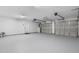 Spacious two car garage with high ceilings and an electric door opener at 281 Highland Forest Dr, Sanford, NC 27332